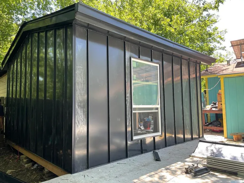 Black standing seam metal wall panels for Metal Roof Installation in Louisville